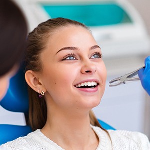 A girl about to receive a tooth extraction