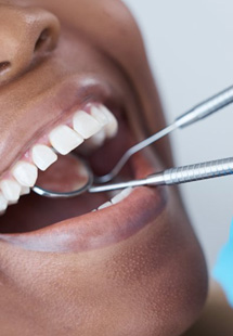 a patient receiving dental care from a dentist near Colleyville