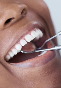 a patient receiving dental care from a dentist near Tyler