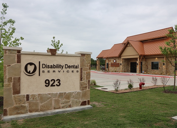Disability Dental Services sign by the road