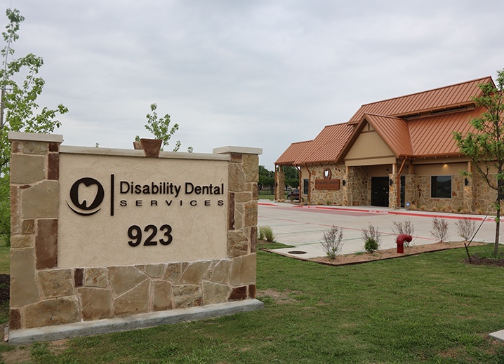Disability Dental Services sign by the road
