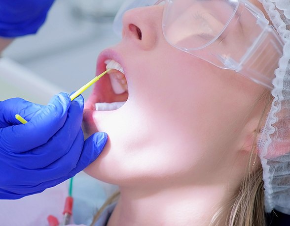 Patient receiving fluoride treatment