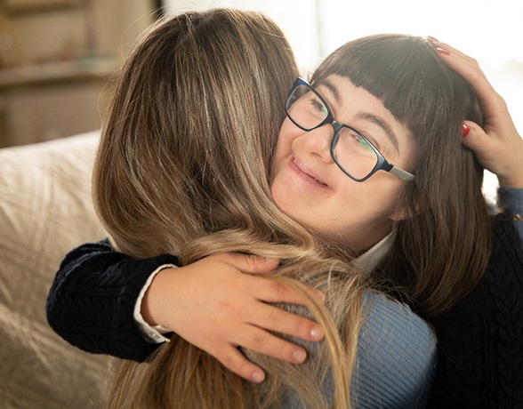 a girl hugging a woman in Grand Prairie